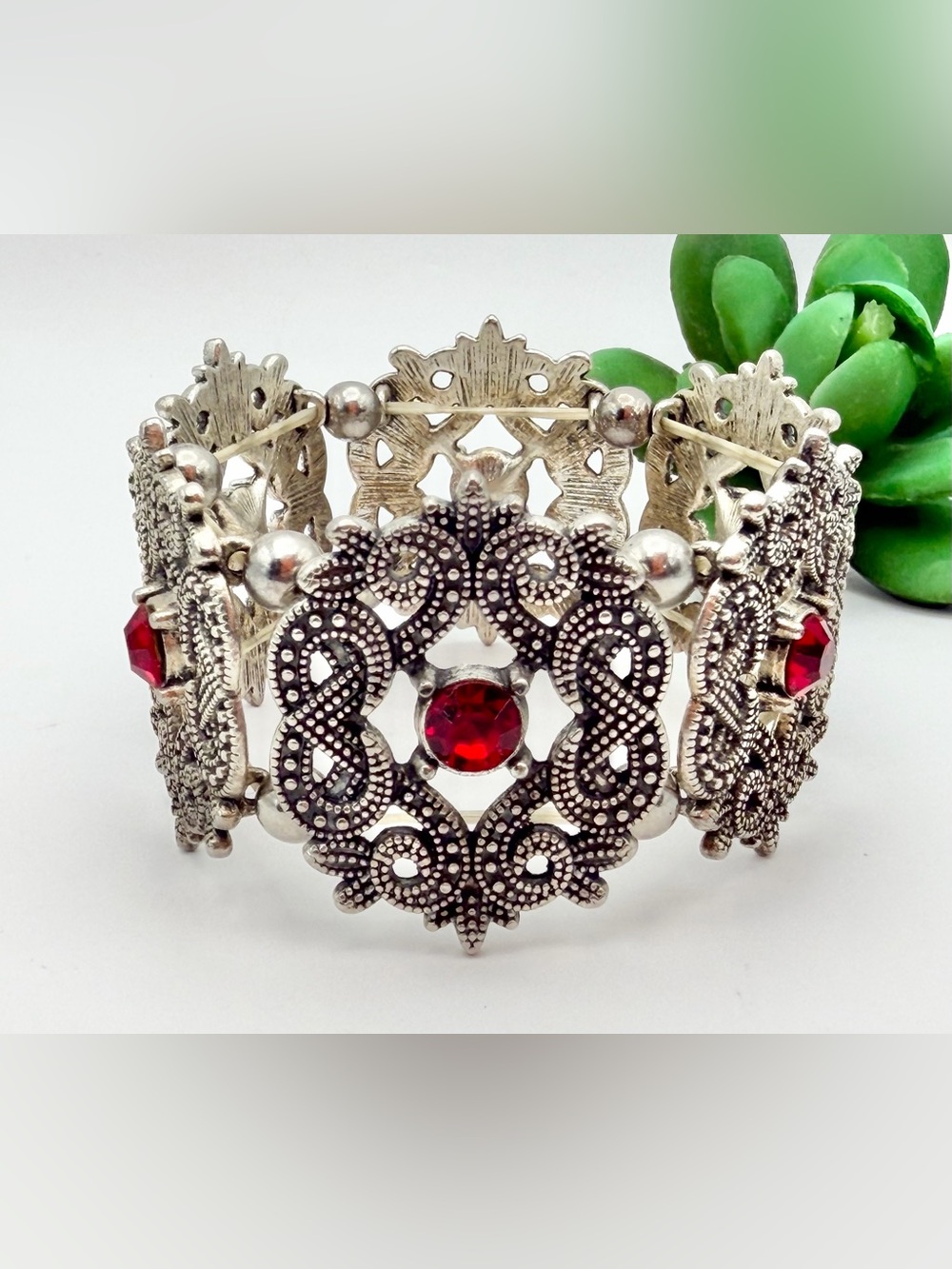 Vintage-Inspired Silver Tone Bracelet with Red Crystal Accents
